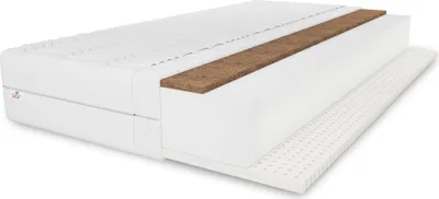 A cross-section of a mattress showing its layered construction, including white foam and a brown coconut fiber layer.
