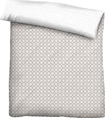 A flat lay of a duvet cover and pillowcase with a geometric pattern.