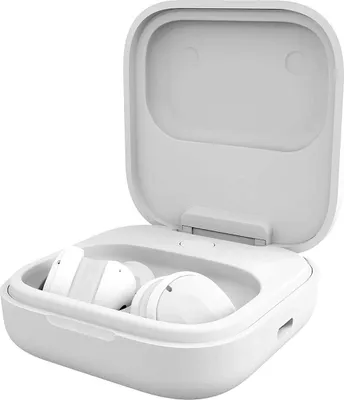 A pair of white wireless earbuds in an open white charging case.