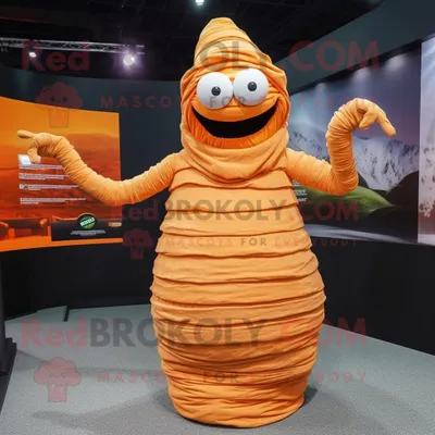 Produktbild von Maskottchen REDBROKOLY kostüm der orangefarbenen Mumie bekleidet mit einem Faltenrock und Hüten