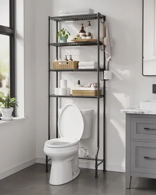 A bathroom shelf unit positioned over a toilet, with various toiletries and towels on the shelves.