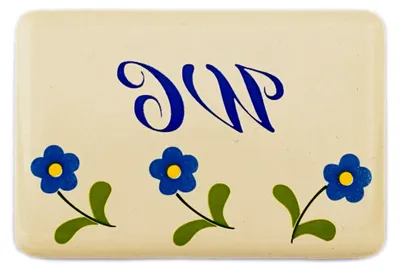 Produktbild von Türschild mit Blumenmotiv aus Emaille