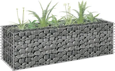 A gabion planter filled with plants, set against a white background.