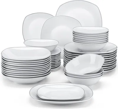 A collection of white ceramic dinnerware with a thin silver rim, neatly stacked and arranged.