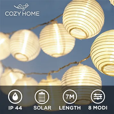 Produktbild von CozyHome LED Lampion Solar Lichterkette Aussen | 7 Meter Gesamtlänge | 20 LEDs warm-weiß – Lichterkette Solar | NICHT batterie-betrieben - Akku Lampions Solar Außen | Solarlichterkette Balkon