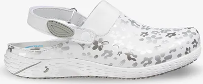 A single white clog-style shoe with a silver floral pattern is shown against a white background.