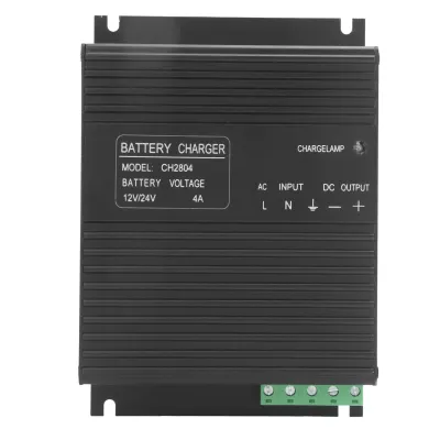 A black battery charger with labels and connection terminals.