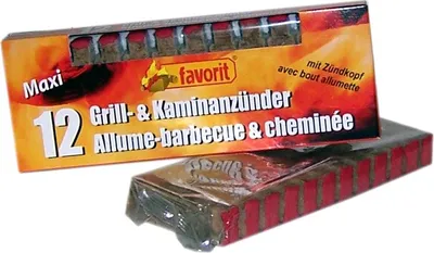 A box of fire starters with a package of fire starters in front of it.