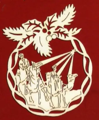 Weihnachtsanhänger der die Heiligen Drei Könige auf ihren Kamelen darstellt die zum Jesuskind reisen