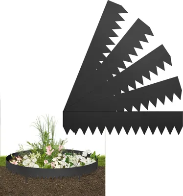 A garden bed border made of black metal with a jagged edge is shown in use, surrounding a bed of flowers. Several more pieces of the border are fanned out in the background.