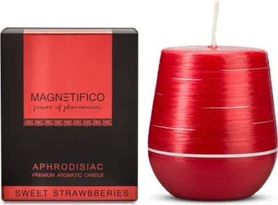 A product shot of a scented candle and its packaging.