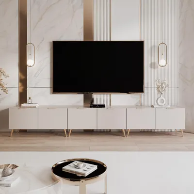A TV stand with a TV on it in a modern living room.