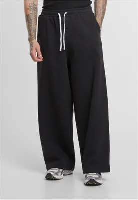 Image de Pantalon de survêtement Urban Classics à jambes larges et molletonné, noir - 3XL