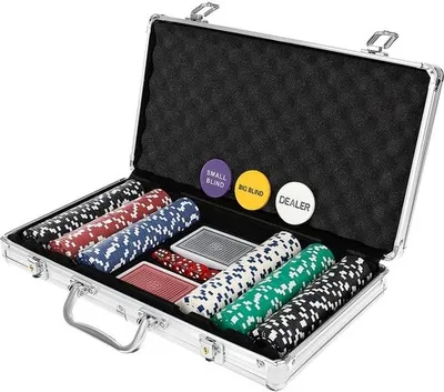 An open aluminum poker chip case with poker chips, playing cards, and dealer/blind buttons.