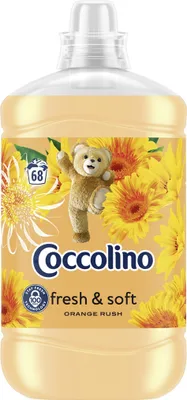 A bottle of Coccolino fabric softener with a teddy bear and floral graphics.