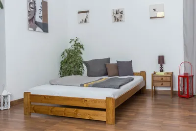 Produktbild von Einzelbett / Gästebett Kiefer Vollholz massiv Eichefarben A9, inkl. Lattenrost  - Abmessung 140 x 200 cm