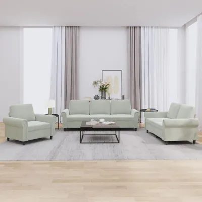 A living room scene with a sofa set and a coffee table.