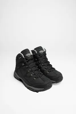 A pair of black hiking boots on a white background.