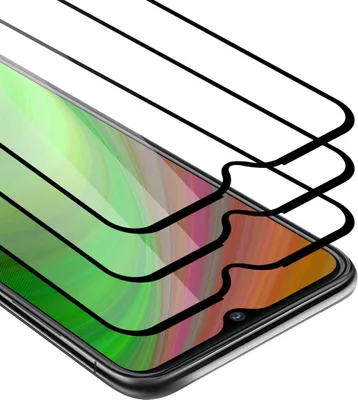 A close-up, angled view of multiple layers of black-bordered screen protectors on top of a smartphone screen.