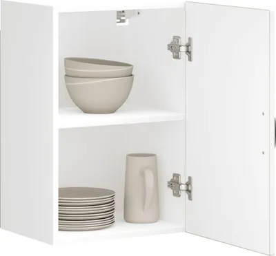An open white cabinet with shelves displaying kitchenware.
