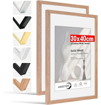 Immagine prodotto di Cornice per foto 30x40 cm in legno di quercia massello, con passepartout per formato A4, ideale per decorare pareti o tavoli. Set da 2 pezzi