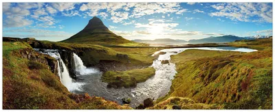 Produktbild von Wallario Wandbild aus Acryl, 125 x 50 cm, freischwebende Optik - Island Panorama Fluss  Berge und blauer Himmel