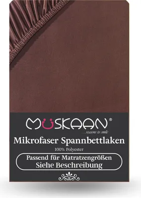 A close-up view of a brown fitted sheet with elasticated corners, showing the texture of the fabric and branding information.