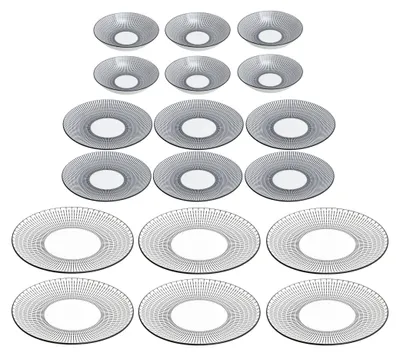 A collection of dinnerware sets arranged in rows.