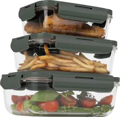 Three stacked glass food storage containers with green lids.