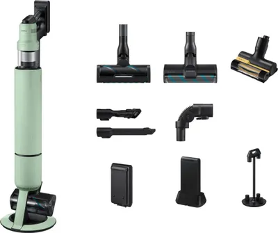 A collection of vacuum cleaner parts and accessories arranged on a white background.