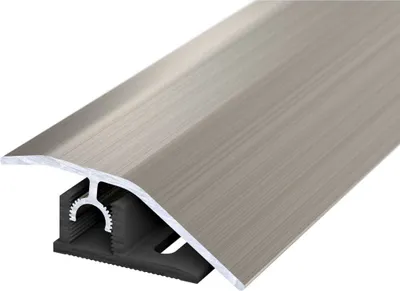 A close-up studio shot of a metal transition strip for flooring.