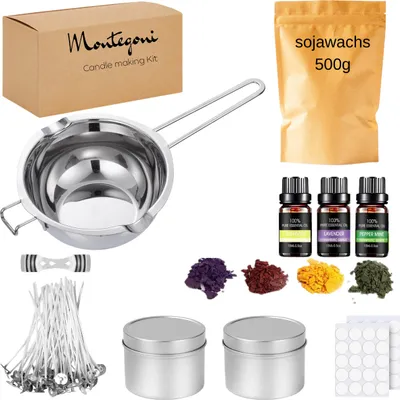 A collection of items for making candles, laid out on a white background.