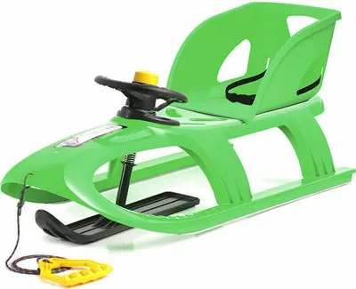 A green plastic sled with a steering wheel and a yellow pull handle, shown against a white background.