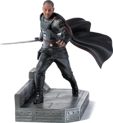 A statue of Moff Gideon from Star Wars, holding a lightsaber and standing on a platform.