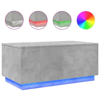 A concrete gray coffee table with blue LED lighting underneath, shown against a white background. Three circular insets show close-ups of the table's edges with different colored lights (white, red, green), and a color wheel graphic is also present.