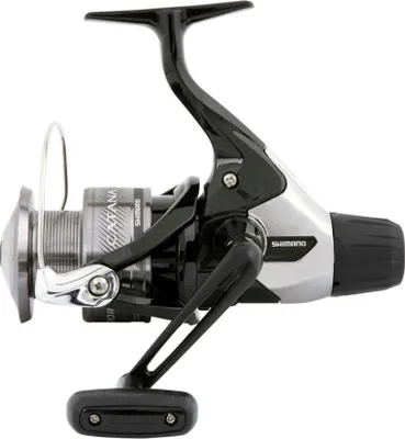 A studio shot of a fishing reel against a white background.