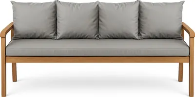A studio shot of a wooden sofa with gray cushions.