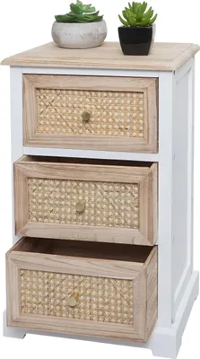 A white and natural wood bedside table with three rattan drawers.