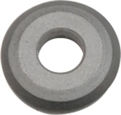 A close-up, centered shot of a circular metal cutting wheel with a hole in the middle.
