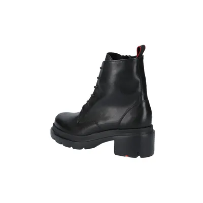 A black leather boot on a white background.