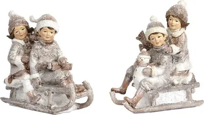 Produktbild von Goodwill Kinder auf Schlitten Creme H 12,5 cm Vorteil sortiert pro 2 Stück