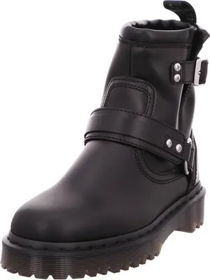 A studio shot of a single black biker boot.