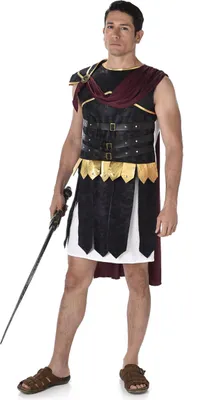 A man wearing a Roman gladiator costume, holding a sword.