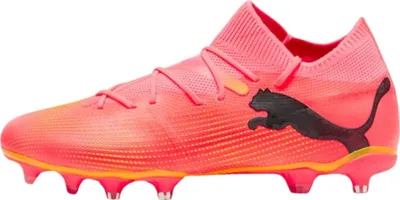 A single pink Puma soccer cleat is shown against a white background.