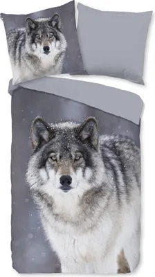 A duvet cover and pillowcase set featuring a wolf image.