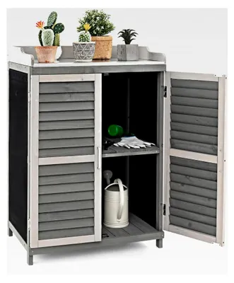 Produktbild von Wetterfester Pflanztisch aus Holz für den Außenbereich, Gartentisch mit Schrank und Metallplatte, Arbeitstisch mit 2 Regalen und 3 Rolltüren, Blumentisch Holzschrank für Terrasse, Garten und Balkon, 67x47x100cm, Grau