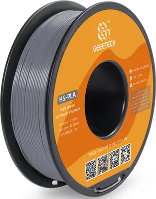 A spool of gray 3D printer filament on a white background.