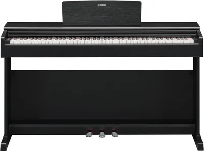 A black digital piano with a music stand.