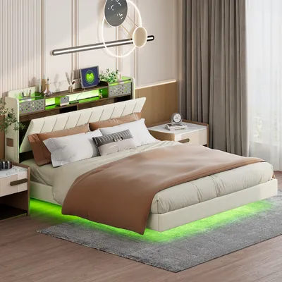 A bedroom scene featuring a bed with a headboard and integrated storage, bedside tables, and decorative elements.