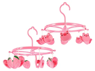 Produktbild von 2 Sockenclips aus Kunststoff in Rosa mit Klammern für Babysocken und Kinderkleidung